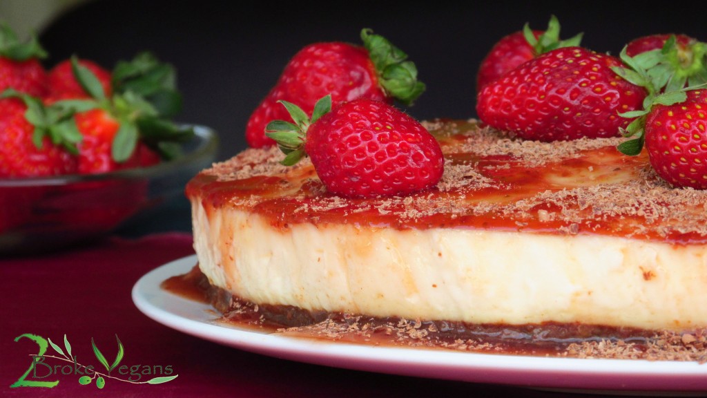 Gluten Free Vegan Cheesecake Recipe topped with Strawberries on a Chocolate Crust